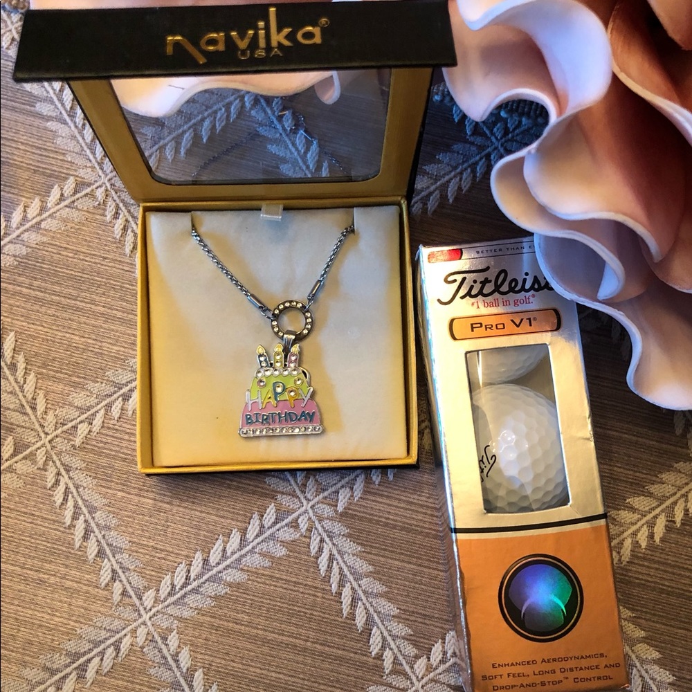 Navika Golf Necklace & Sleeve of Titleist Pro V1s
